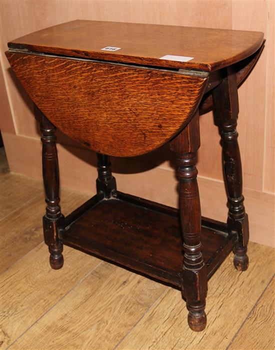 An oak swivel top drop flap table, W.50cm